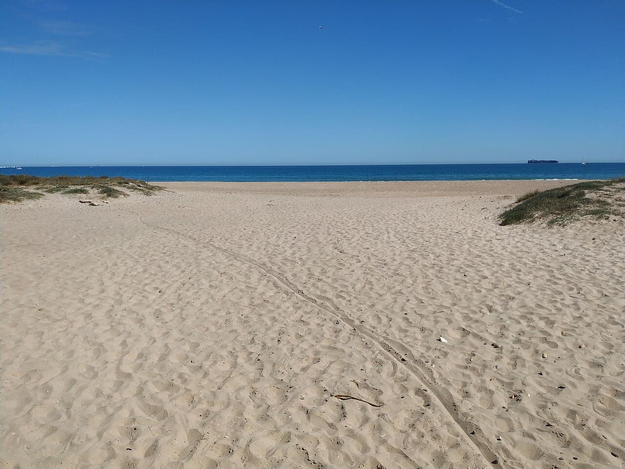 Sand, dunes and Mediterranean water at El Saler Beach near Valencia